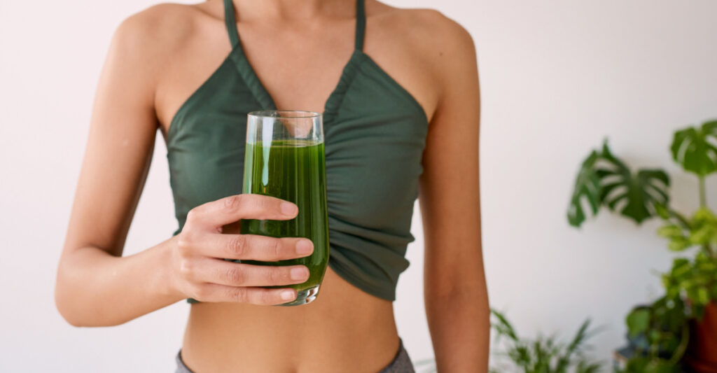 Woman holding a colon cleanse drink