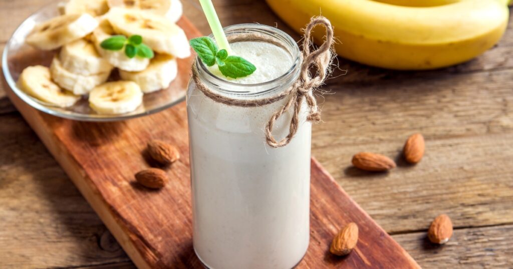 Banana and almond butter smoothie in a glass
