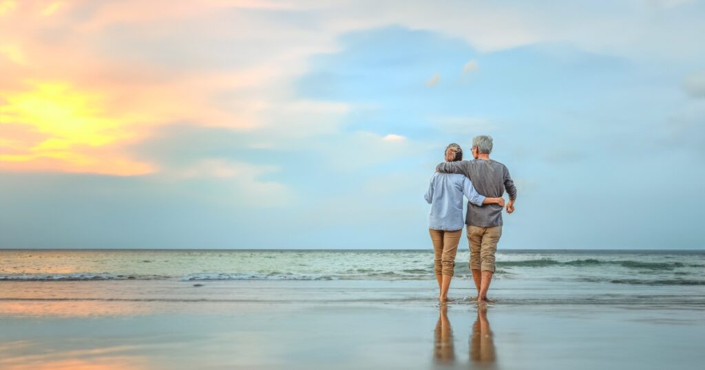 Elderly person walking outdoors for better digestion