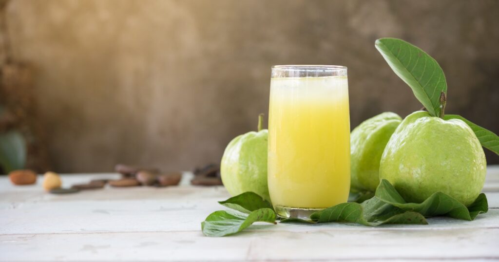 Orange and apple smoothie in a glass