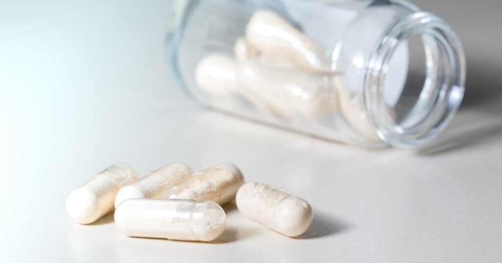 Close up of probiotic capsules in a jar