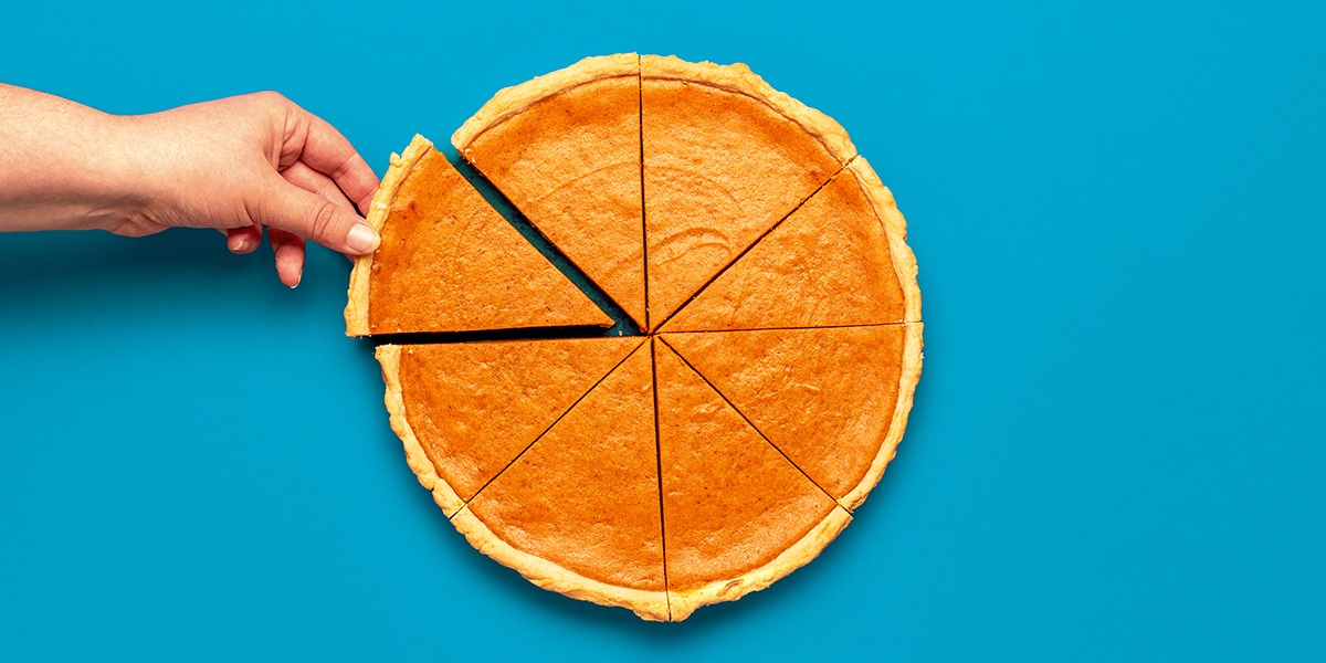 An image of pumpkin pie on a blue table